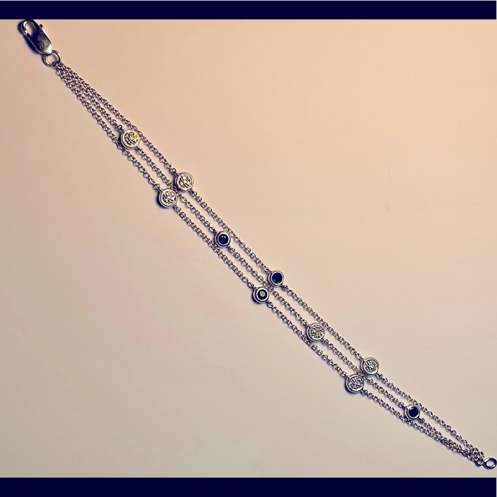Elegant Silver Bracelet with Diamond Chips and Deep Blue Sapphire